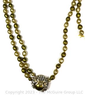 Vintage Double Strand of Faux Green Pearls with Rhinestone Clasp. Broken 