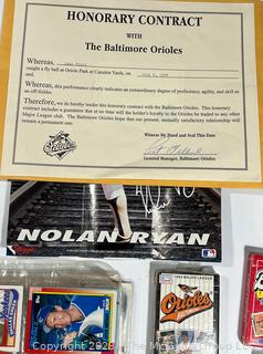 Collection of Memorabilia Including 1980's-90's Baseball Trading Cards, Bumper Stickers, Orioles Honorary Contract for Catching a Foul Ball, a Mike Mussina Game Program and oversized Soft Ball 