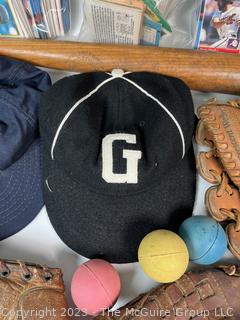 Collection of Vintage Baseball Items Including Gloves, Baseball Cards, Bat and Hats. 