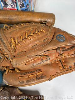 Collection of Vintage Baseball Items Including Gloves, Baseball Cards, Bat and Hats. 