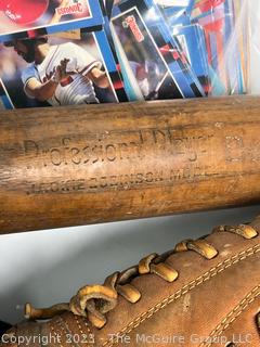 Collection of Vintage Baseball Items Including Gloves, Baseball Cards, Bat and Hats. 