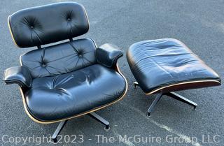 Black Leather Charles and Ray Eames Designed for Herman Miller Lounge Chair & Ottoman.  50th Anniversary Edition.  Wear to leather.  