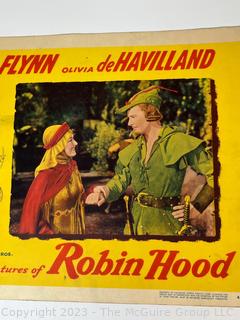 Three (3) 1948 Vintage Lobby Cards from The Adventures of Robin Hood Starring Errol Flynn, Olivia De Havilland, Basil Rathbone and Claude Rains.  11" x 14"