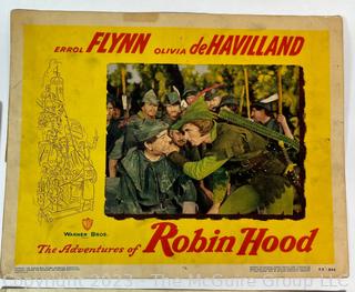 Three (3) 1948 Vintage Lobby Cards from The Adventures of Robin Hood Starring Errol Flynn, Olivia De Havilland, Basil Rathbone and Claude Rains.  11" x 14"