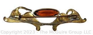 Art Nouveau Brooch with Swans Surrounding Amber Center Stone. 