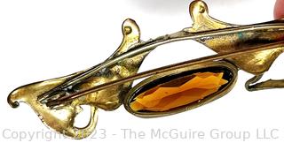 Art Nouveau Brooch with Swans Surrounding Amber Center Stone. 