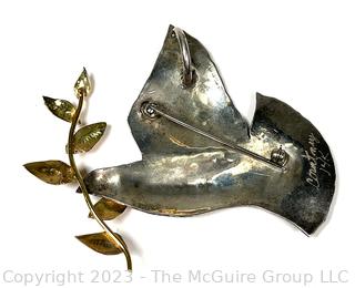 Dove of Peace Sterling Silver and Brass Brooch Signed by Jewelry Artist Courtney Peterson. Sterling mark