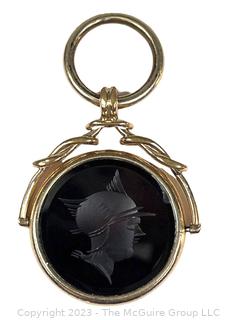 10Kt Gold Swivel Watch Fob with Inset Carved Stone. 