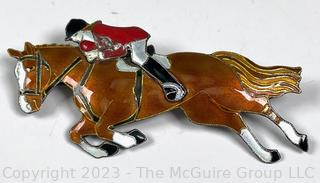 Sterling Silver and Enamel Brooch of Horse and Rider. 7.2g