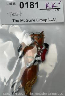 Sterling Silver and Enamel Brooch of Horse and Rider. 7.2g