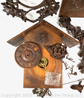 Intricately Carved Wooden Cuckoo Clock and Movement Parts