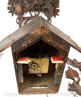 Intricately Carved Wooden Cuckoo Clock and Movement Parts