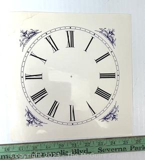 Large Group of Paper Clock Faces