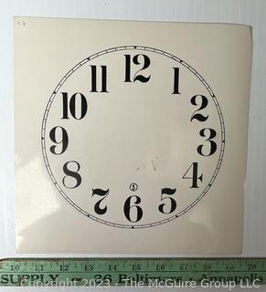 Large Group of Paper Clock Faces