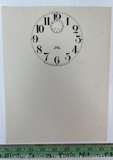 Large Group of Paper Clock Faces