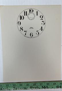 Large Group of Paper Clock Faces