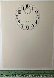 Large Group of Paper Clock Faces