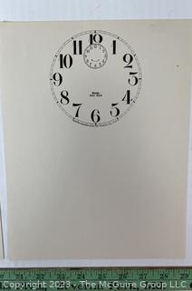 Large Group of Paper Clock Faces