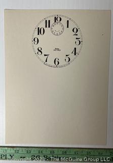 Large Group of Paper Clock Faces