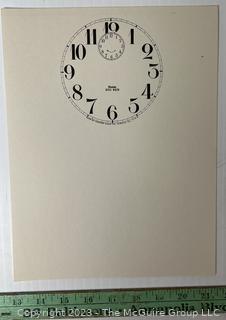 Large Group of Paper Clock Faces