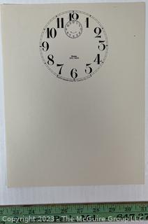 Large Group of Paper Clock Faces