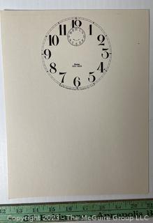 Large Group of Paper Clock Faces