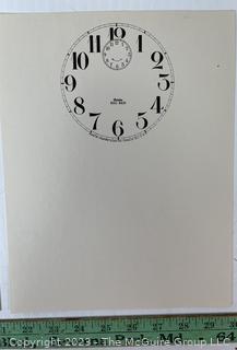 Large Group of Paper Clock Faces