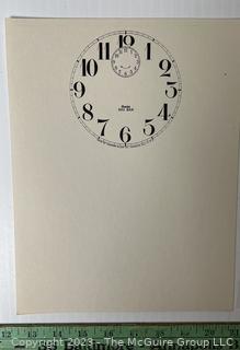 Large Group of Paper Clock Faces