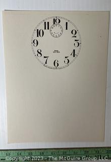 Large Group of Paper Clock Faces