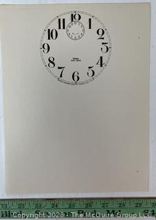 Large Group of Paper Clock Faces