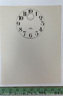 Large Group of Paper Clock Faces