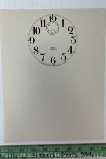 Large Group of Paper Clock Faces