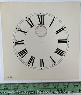 Large Group of Paper Clock Faces