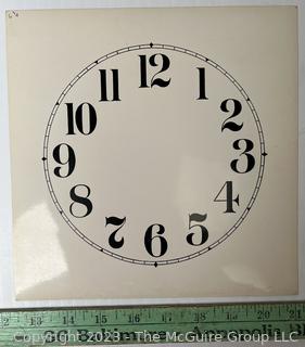 Large Group of Paper Clock Faces