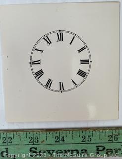 Large Group of Paper Clock Faces