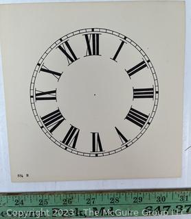 Large Group of Paper Clock Faces