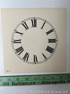 Large Group of Paper Clock Faces