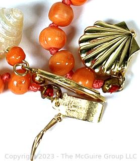 Small Shell with Coral Beads and 14Kt Gold Findings. 