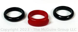 Three (3) Red and Black Glass Stackable Rings