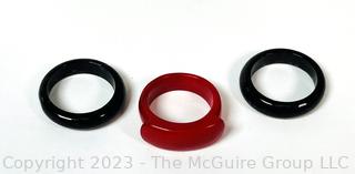 Three (3) Red and Black Glass Stackable Rings