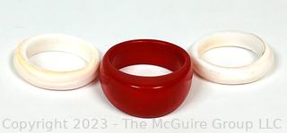 Three (3) Red and White Glass Stackable Rings