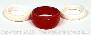 Three (3) Red and White Glass Stackable Rings