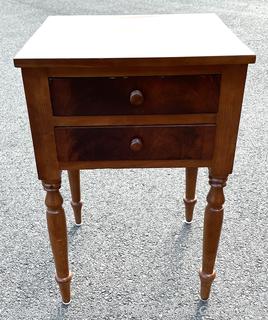 Sheraton Cross-Banded Two Drawer Stand Table with Turned Legs.  Stamped inside drawer "C.A. SP Undertaker and Dealer in all Kinds of Furniture. 1118 2nd St, Harrisburg, PA". Measures 17 x 19 x 30"