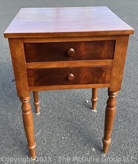 Sheraton Cross-Banded Two Drawer Stand Table with Turned Legs.  Stamped inside drawer "C.A. SP Undertaker and Dealer in all Kinds of Furniture. 1118 2nd St, Harrisburg, PA". Measures 17 x 19 x 30"