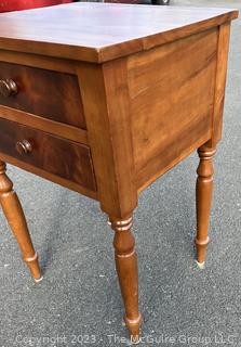 Sheraton Cross-Banded Two Drawer Stand Table with Turned Legs.  Stamped inside drawer "C.A. SP Undertaker and Dealer in all Kinds of Furniture. 1118 2nd St, Harrisburg, PA". Measures 17 x 19 x 30"