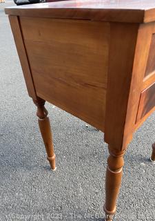 Sheraton Cross-Banded Two Drawer Stand Table with Turned Legs.  Stamped inside drawer "C.A. SP Undertaker and Dealer in all Kinds of Furniture. 1118 2nd St, Harrisburg, PA". Measures 17 x 19 x 30"