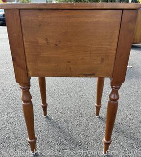 Sheraton Cross-Banded Two Drawer Stand Table with Turned Legs.  Stamped inside drawer "C.A. SP Undertaker and Dealer in all Kinds of Furniture. 1118 2nd St, Harrisburg, PA". Measures 17 x 19 x 30"