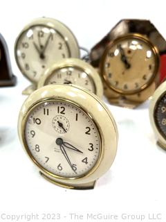 Eight (8) Travel Alarm Clocks