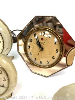 Eight (8) Travel Alarm Clocks