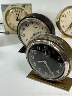 Seven (7) Travel Wind Up Alarm Clocks